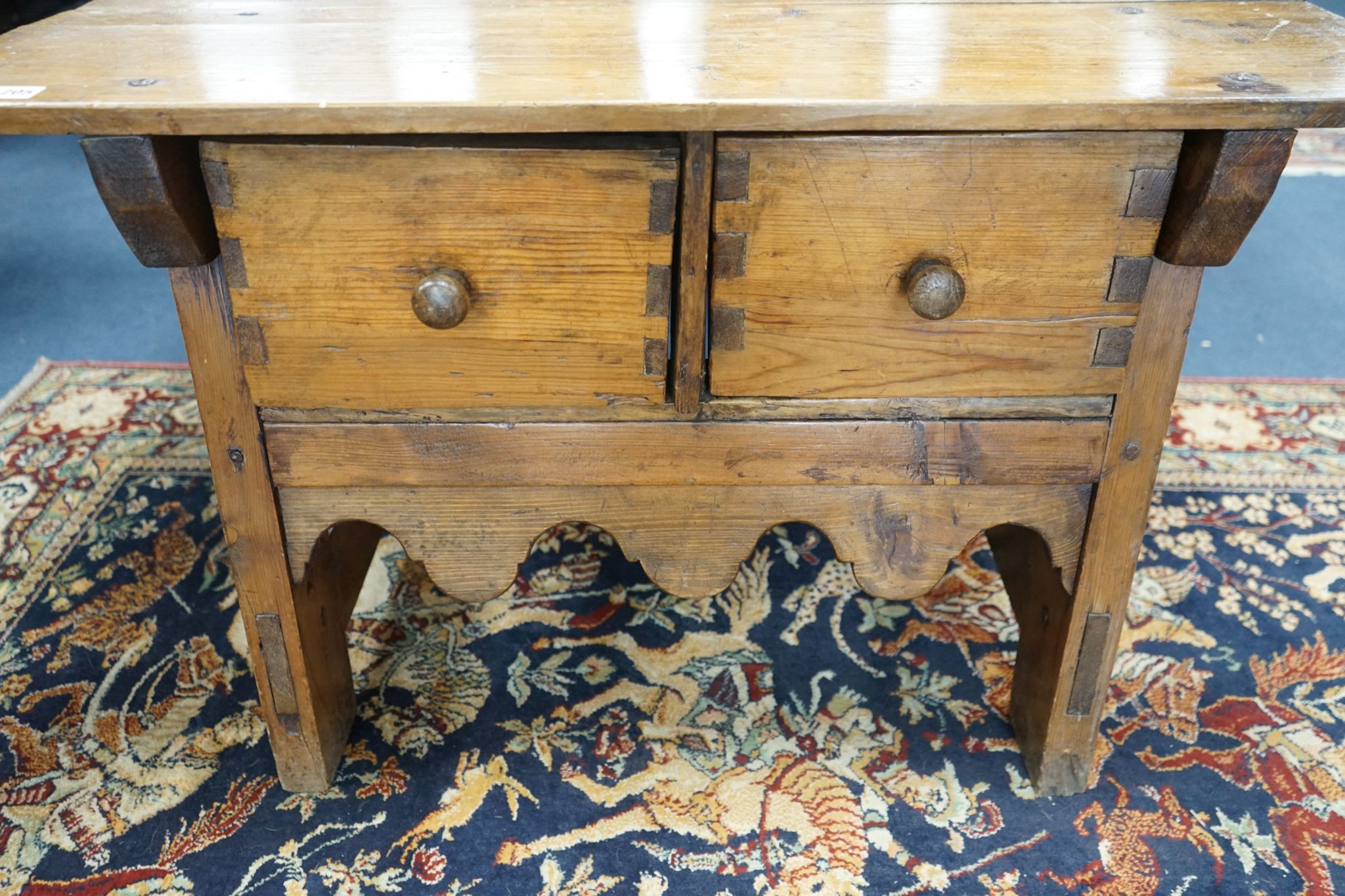 An 18th century style French Provincial fruitwood two drawer low table, width 95cm, depth 59cm, height 60cm